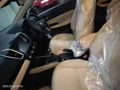 interior front seats and dashboard of a Honda City
