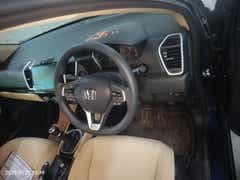Interior dashboard view of a Honda City