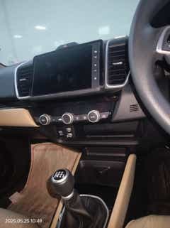 Interior dashboard and gear lever of a Honda City