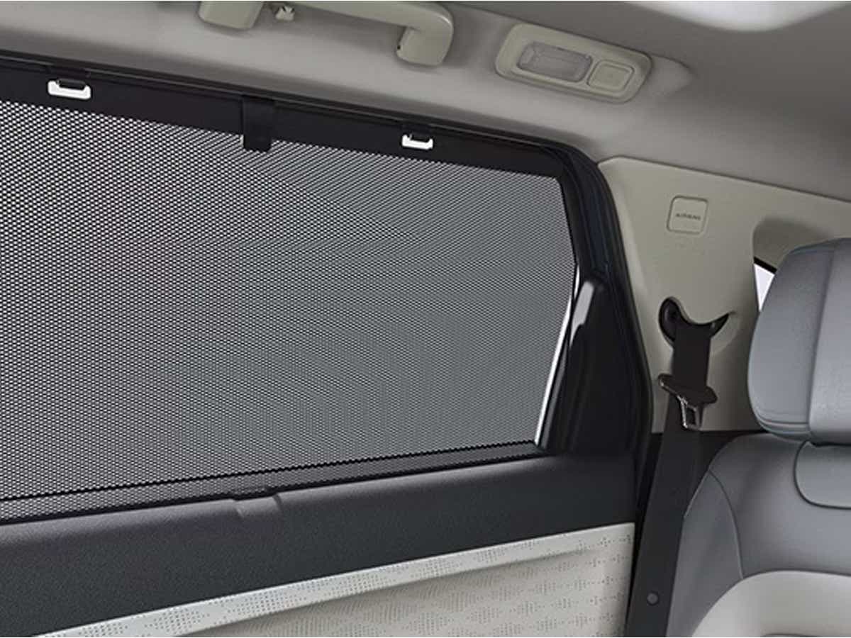 Rear window sunshade and seat detail of a Tata Harrier EV
