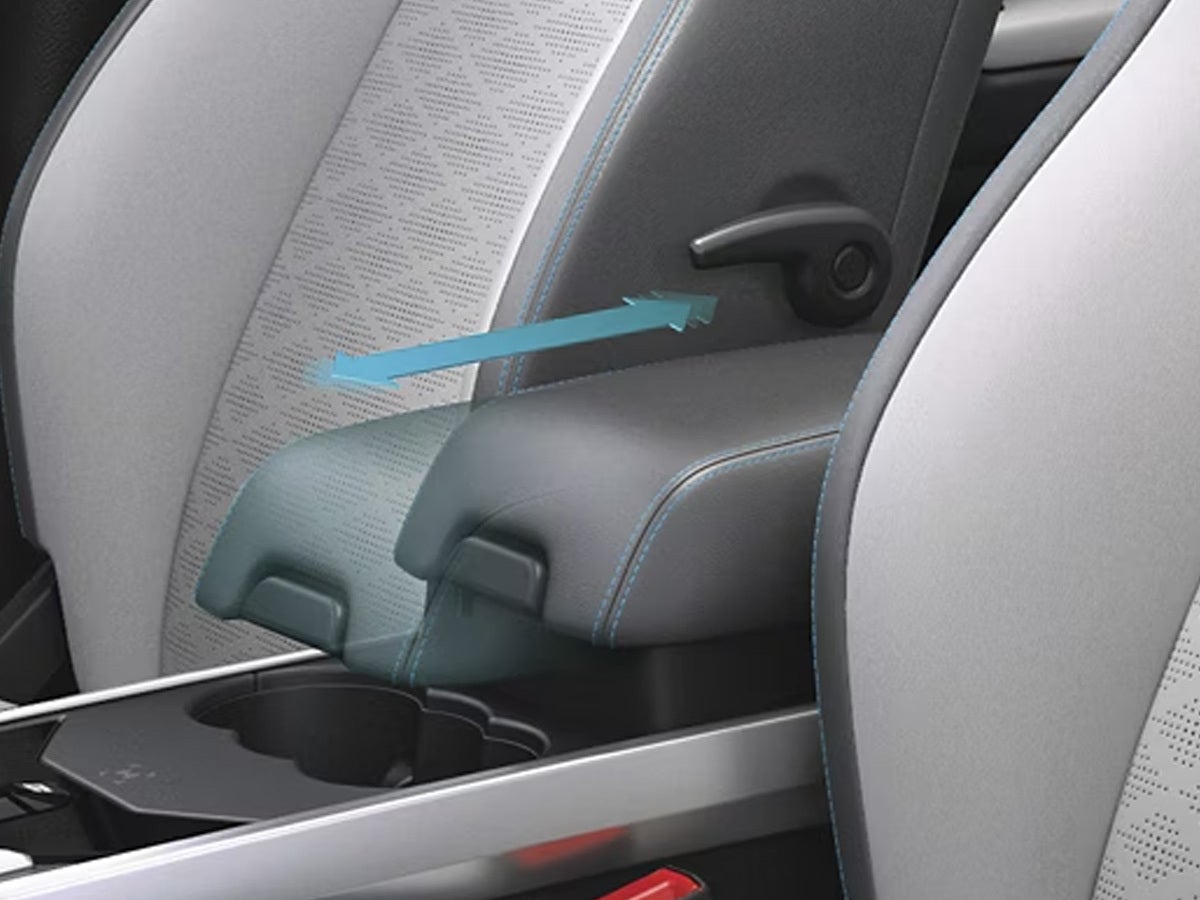 Armrest and cup holder area of a Tata Harrier EV