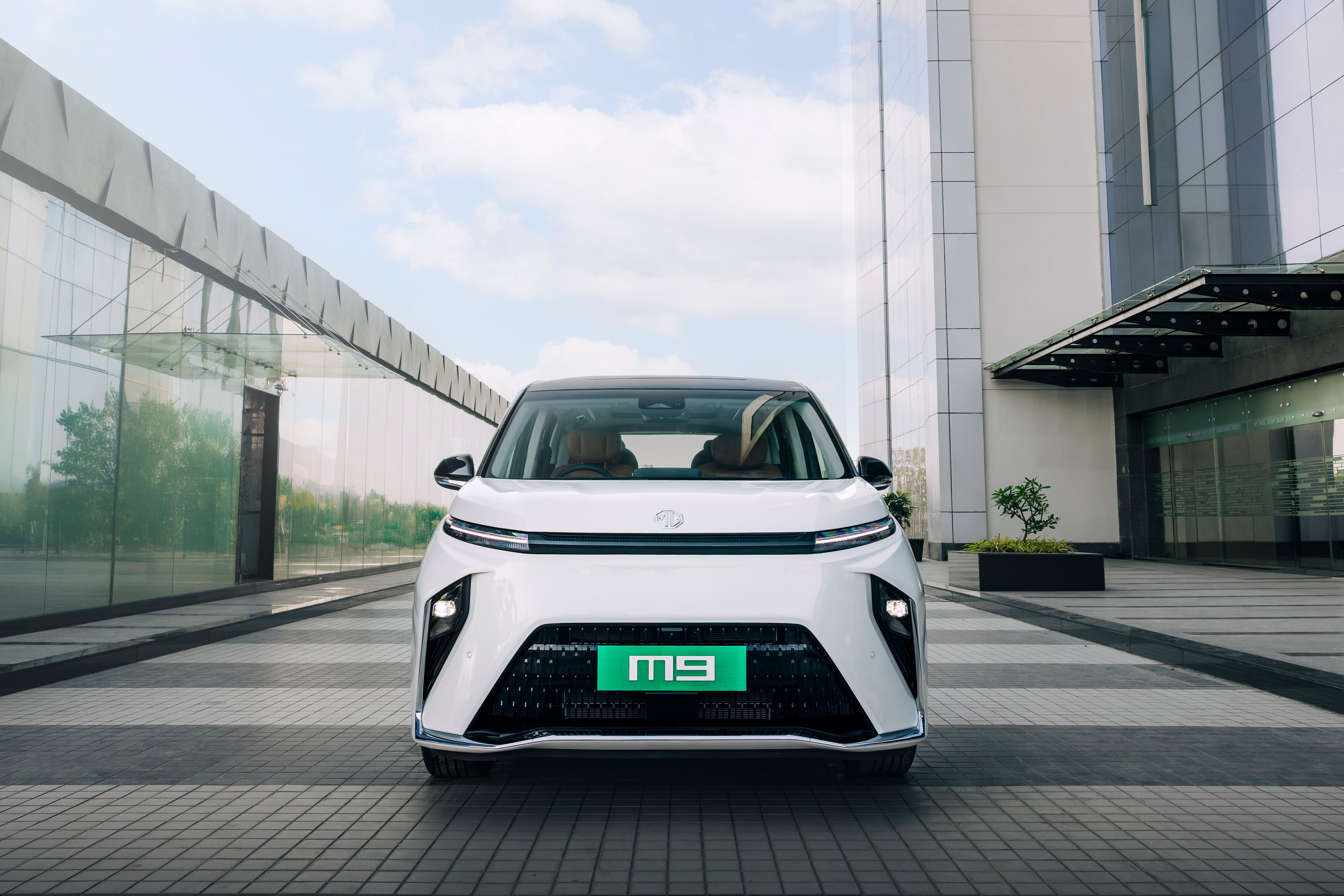 front view of a Pearl White with Black Roof MG M9