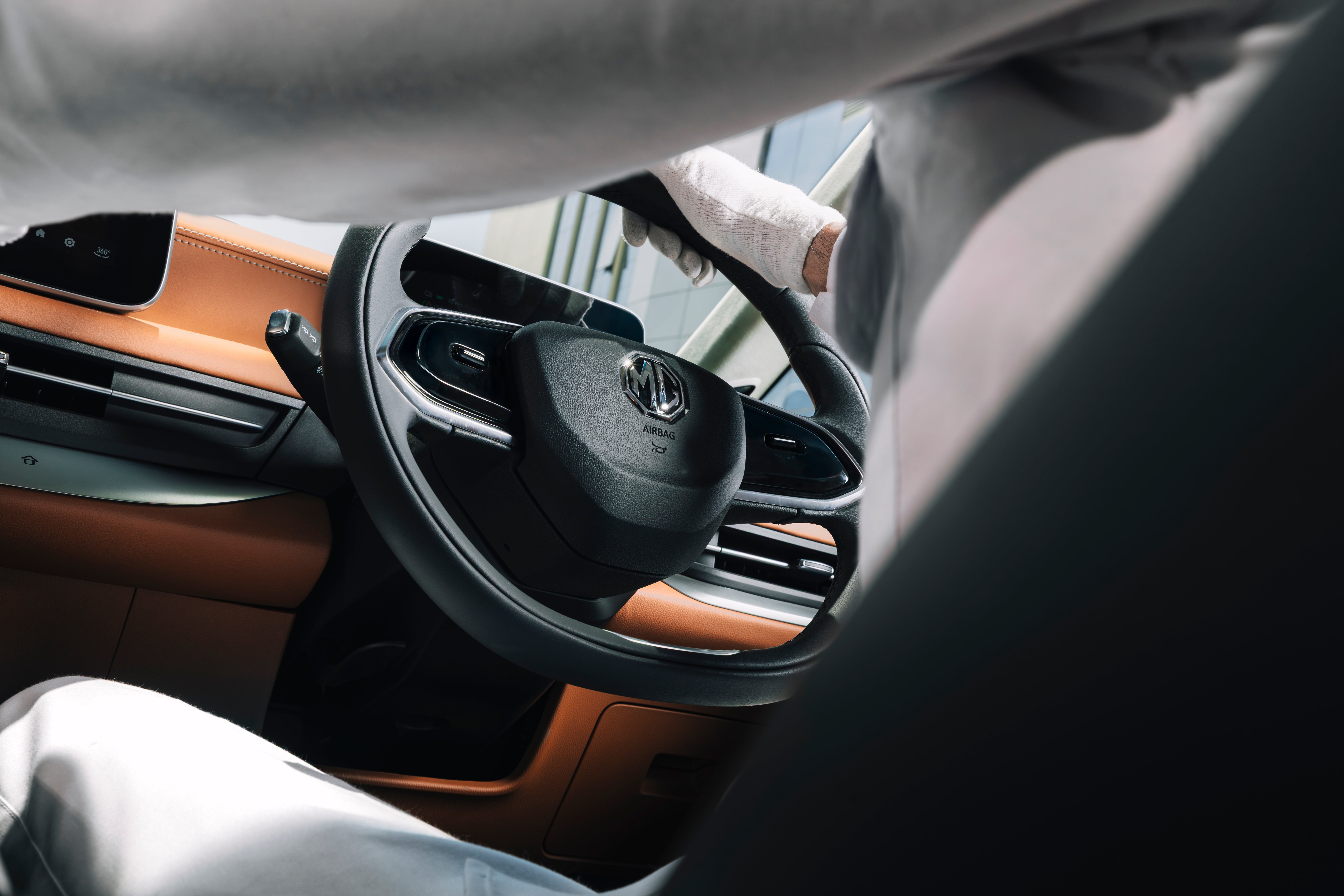 steering wheel and dashboard of a MG M9