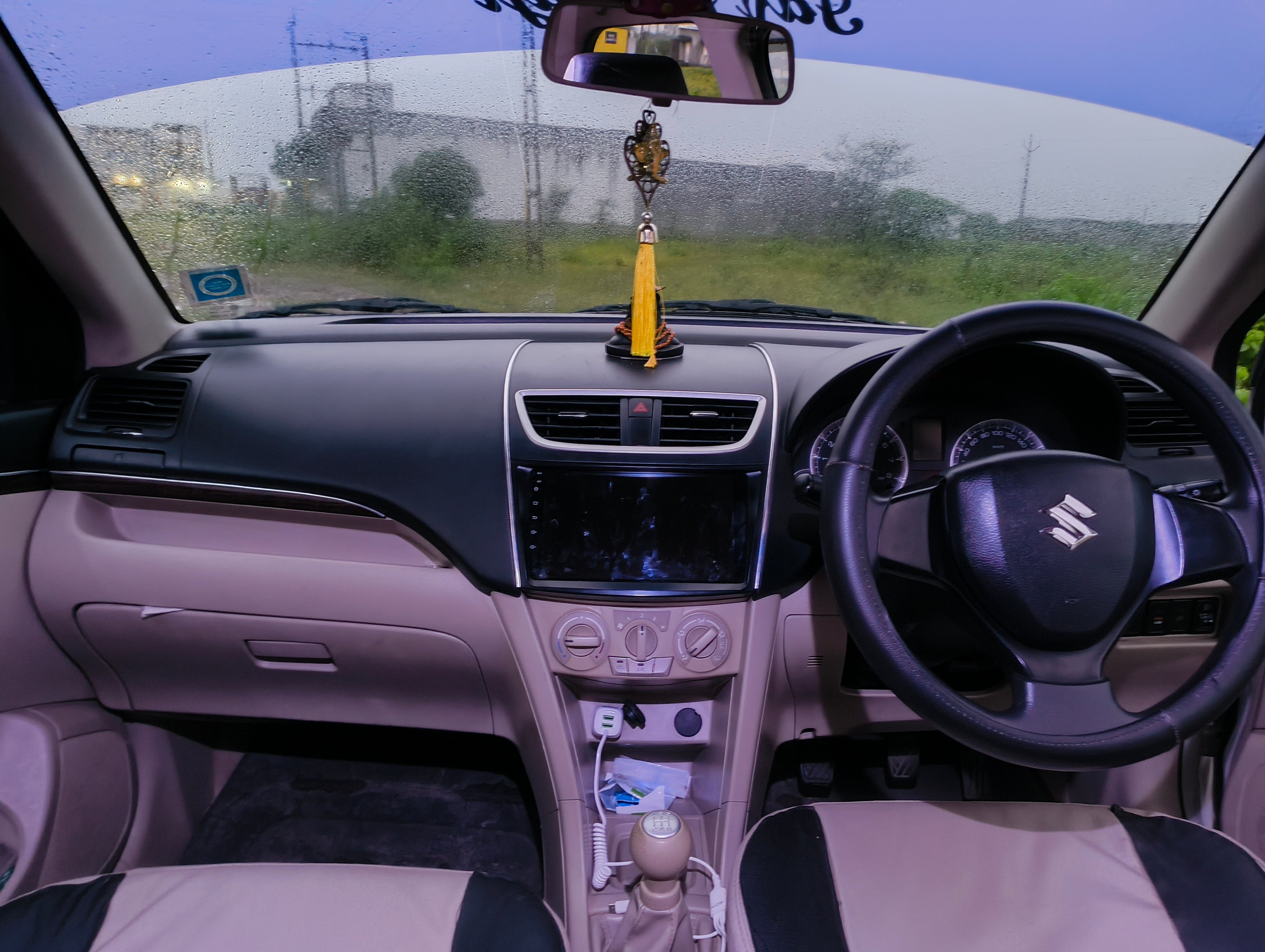 interior dashboard of a Maruti Suzuki Dzire 2018-2023