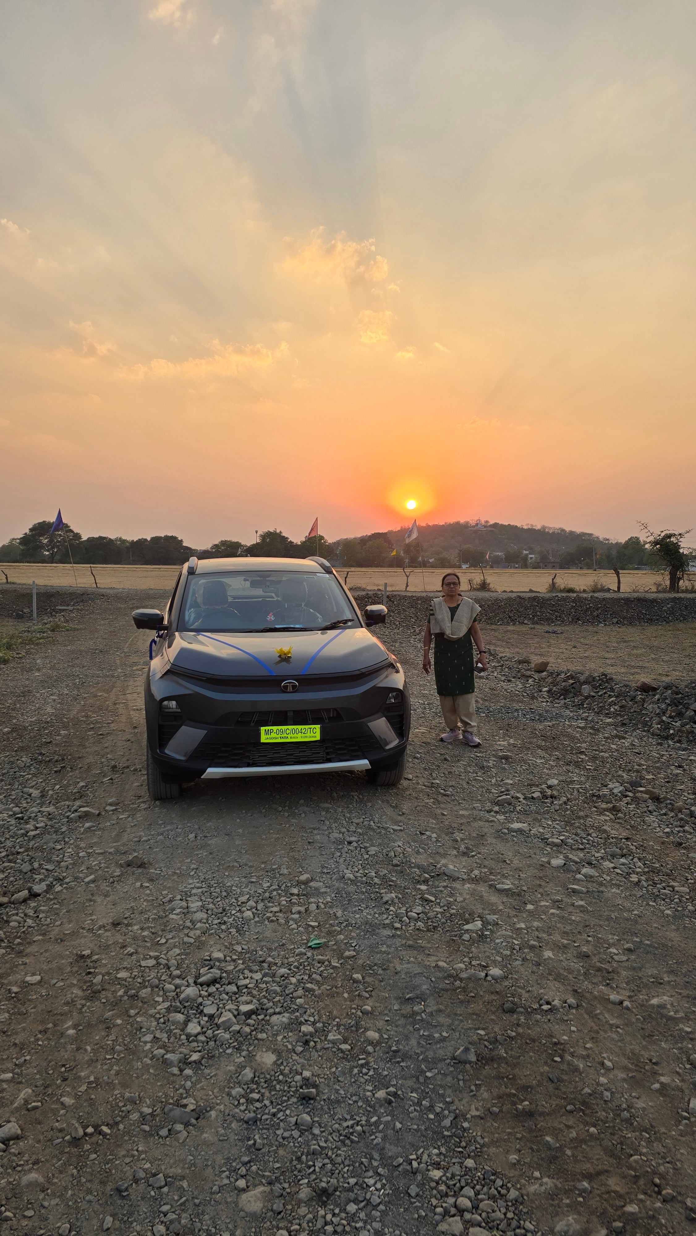 Front view of a Tata Nexon at sunset