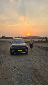 Front view of a Tata Nexon at sunset