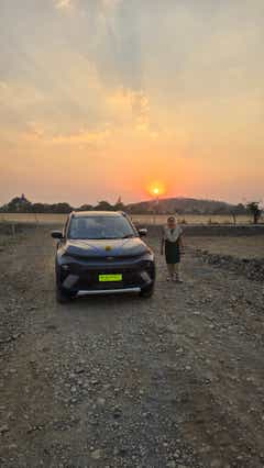 Front view of a Tata Nexon at sunset