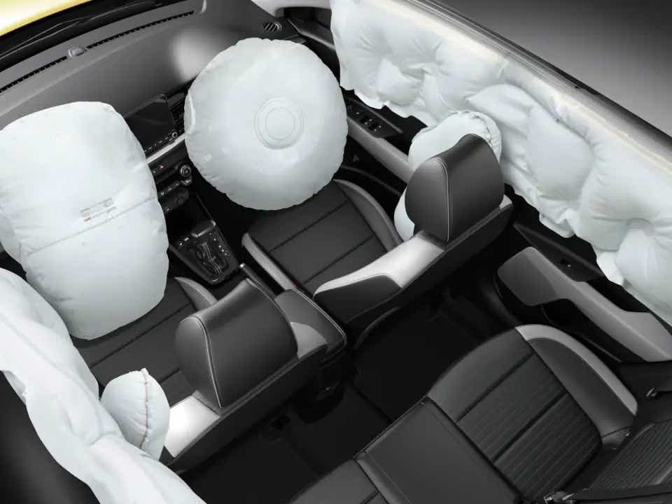 Interior with deployed airbags of a Kia Stonic