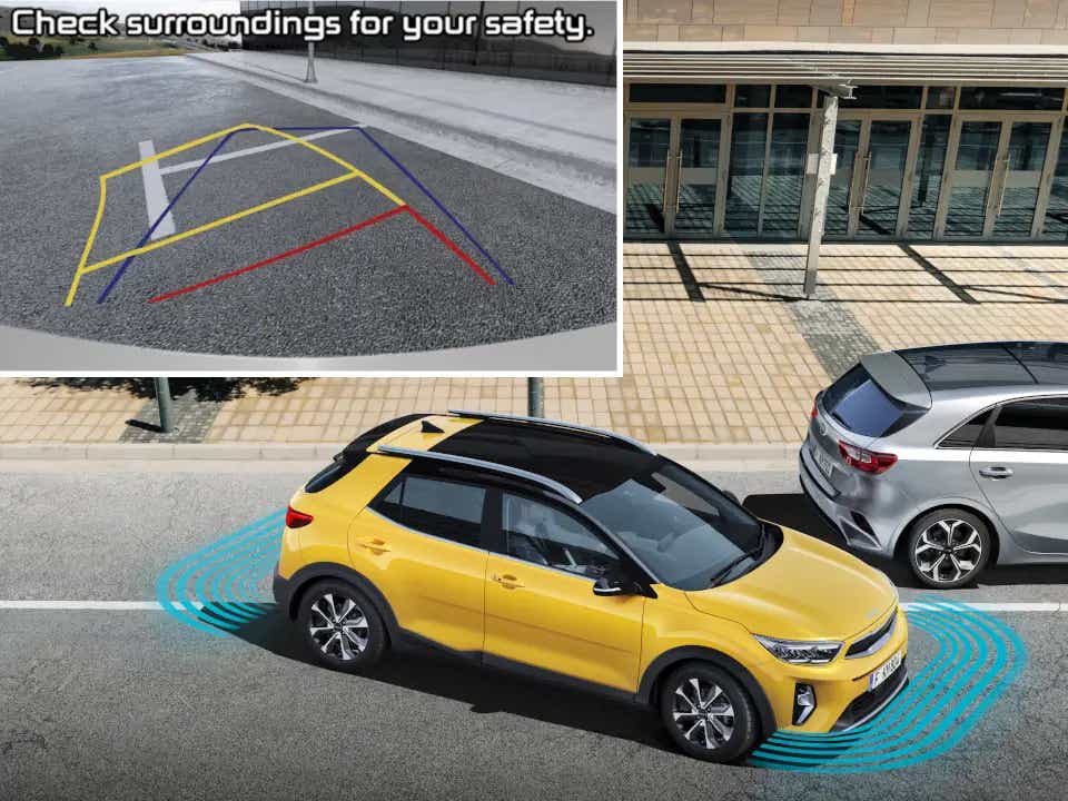 Side view of a Kia Stonic with parking assist graphics