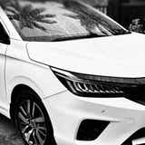 Front left headlight and wheel of a Honda City