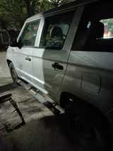 side view of a Mahindra Bolero Neo