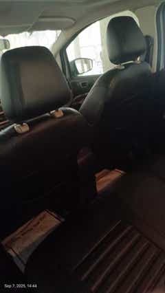 rear seat area and front seatbacks of a Ford Endeavour