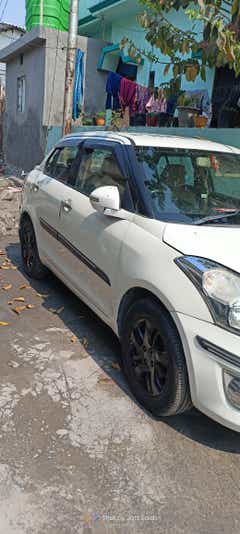 front-side view of a Maruti Suzuki Dzire 2018-2023
