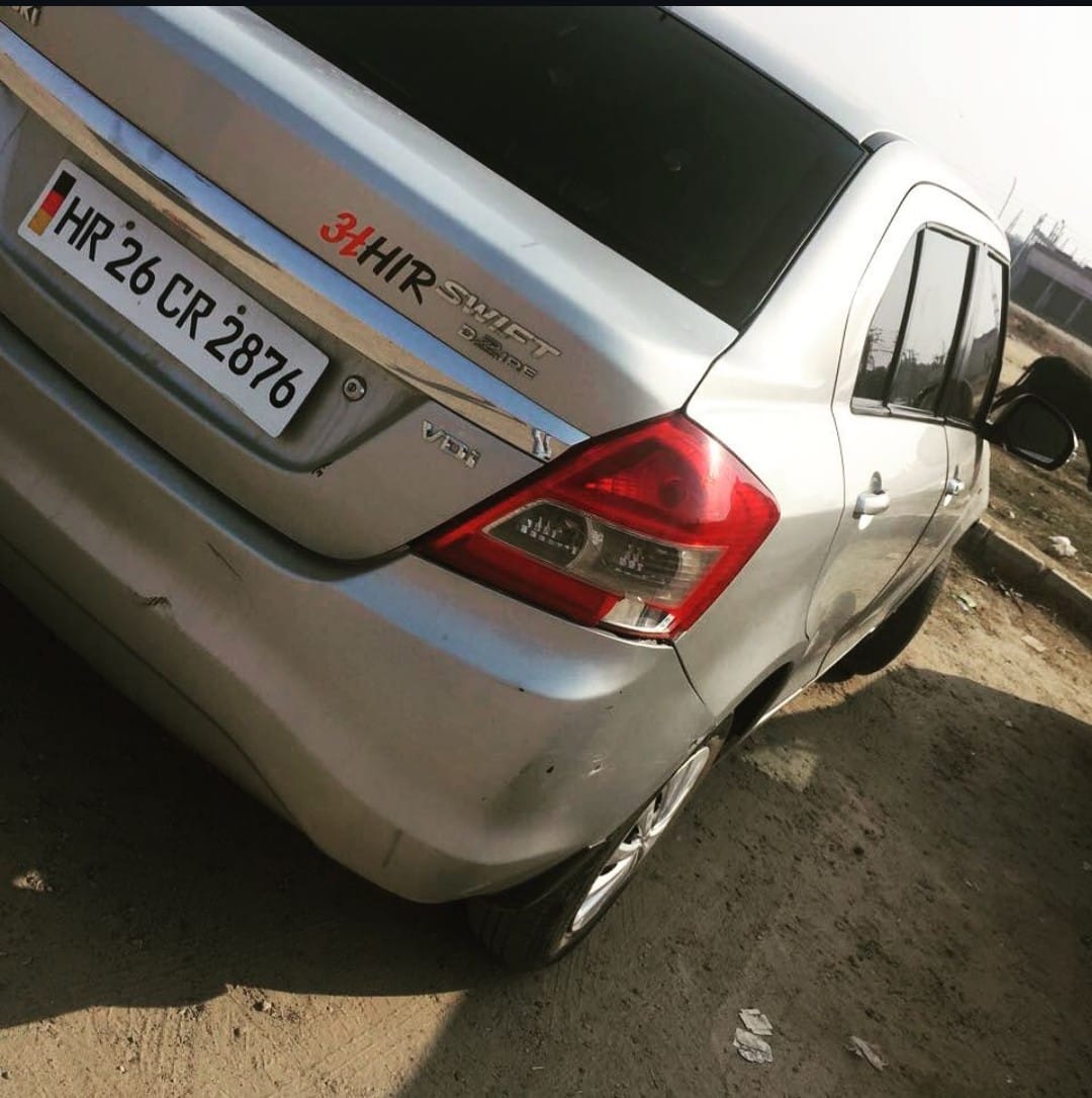rear three-quarter of a Maruti Suzuki Dzire 2018-2023