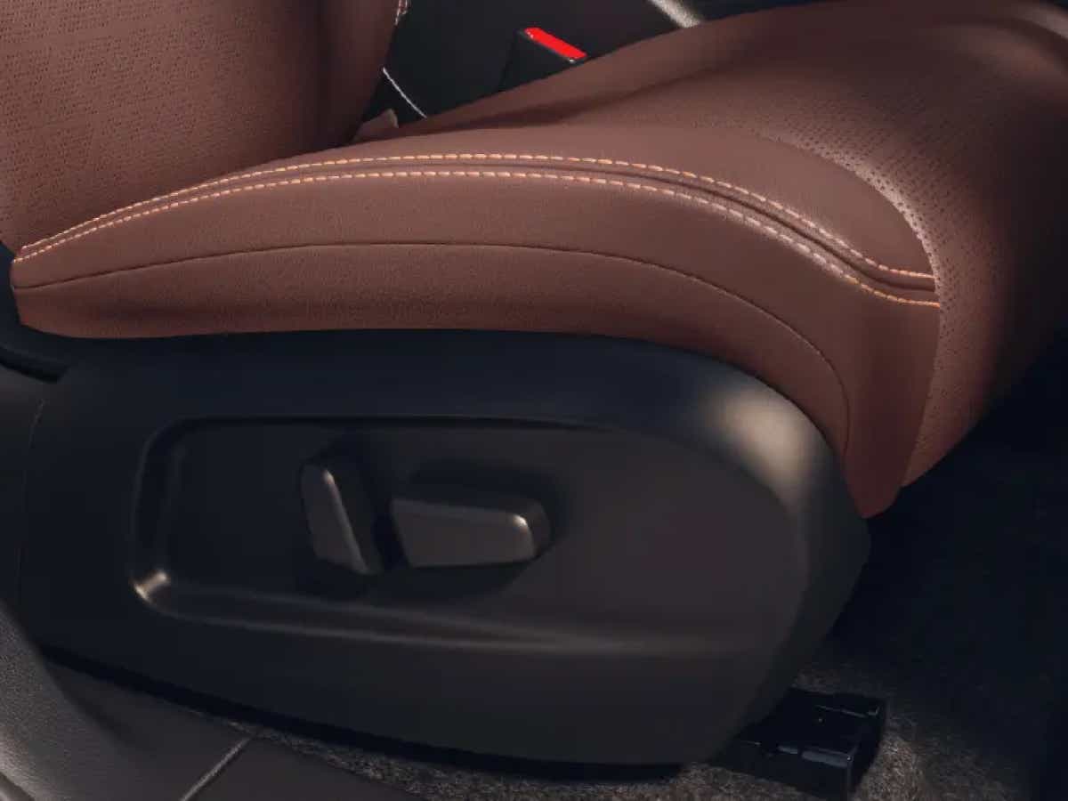 Close-up of seat adjustment controls in a Vinfast VF7