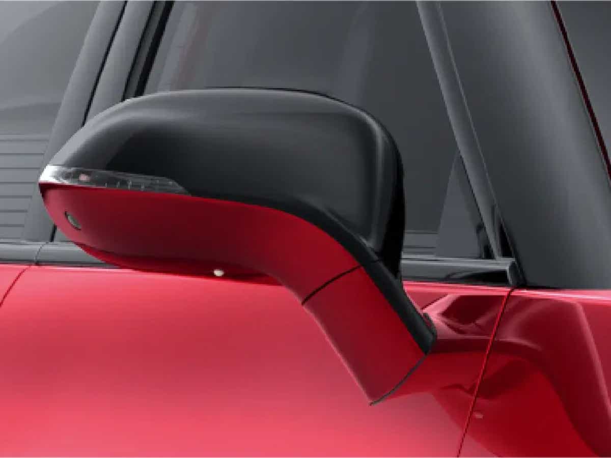 Side mirror close-up of a Vinfast VF7