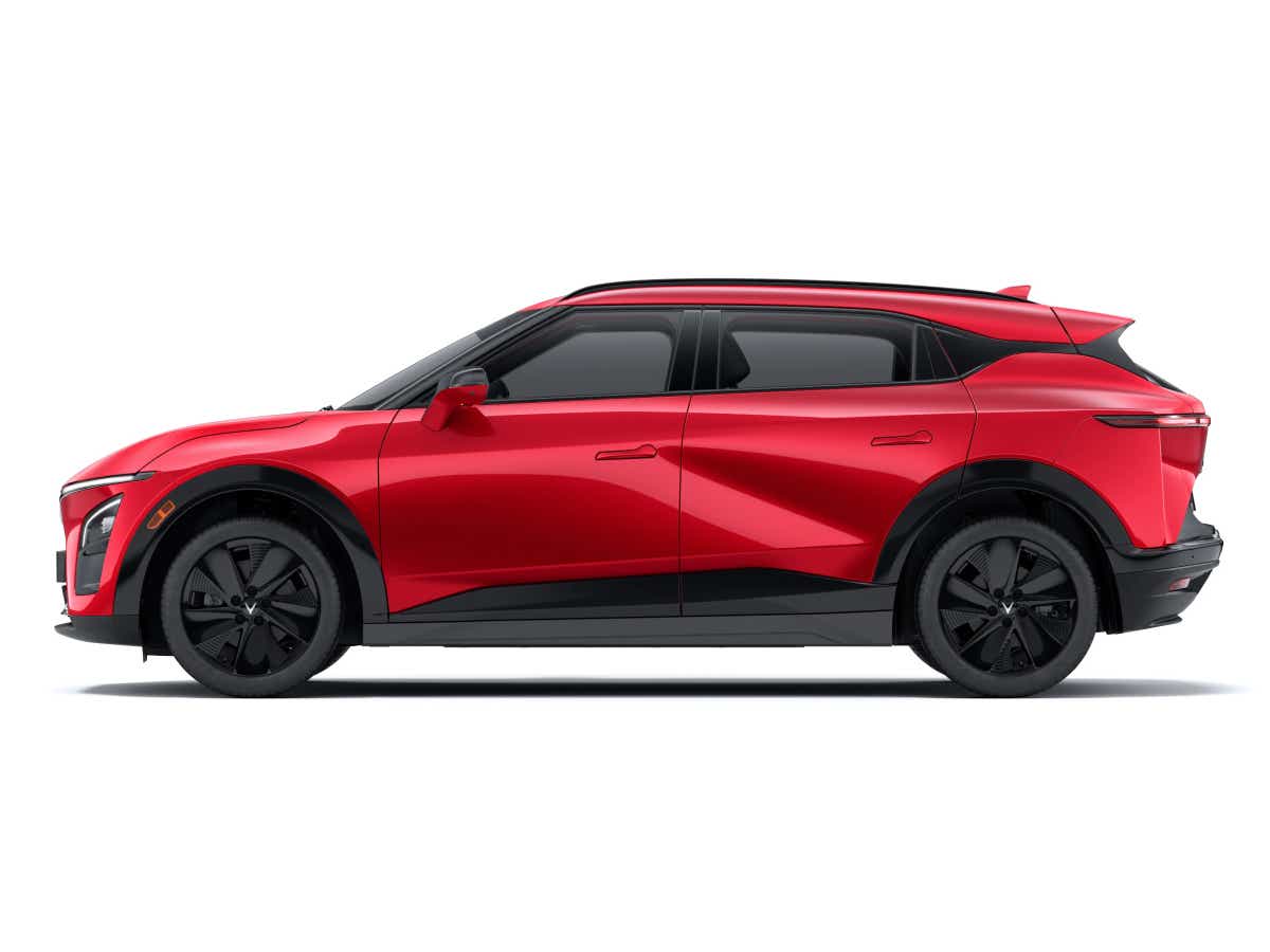 side view of a Crimson Red Vinfast VF7