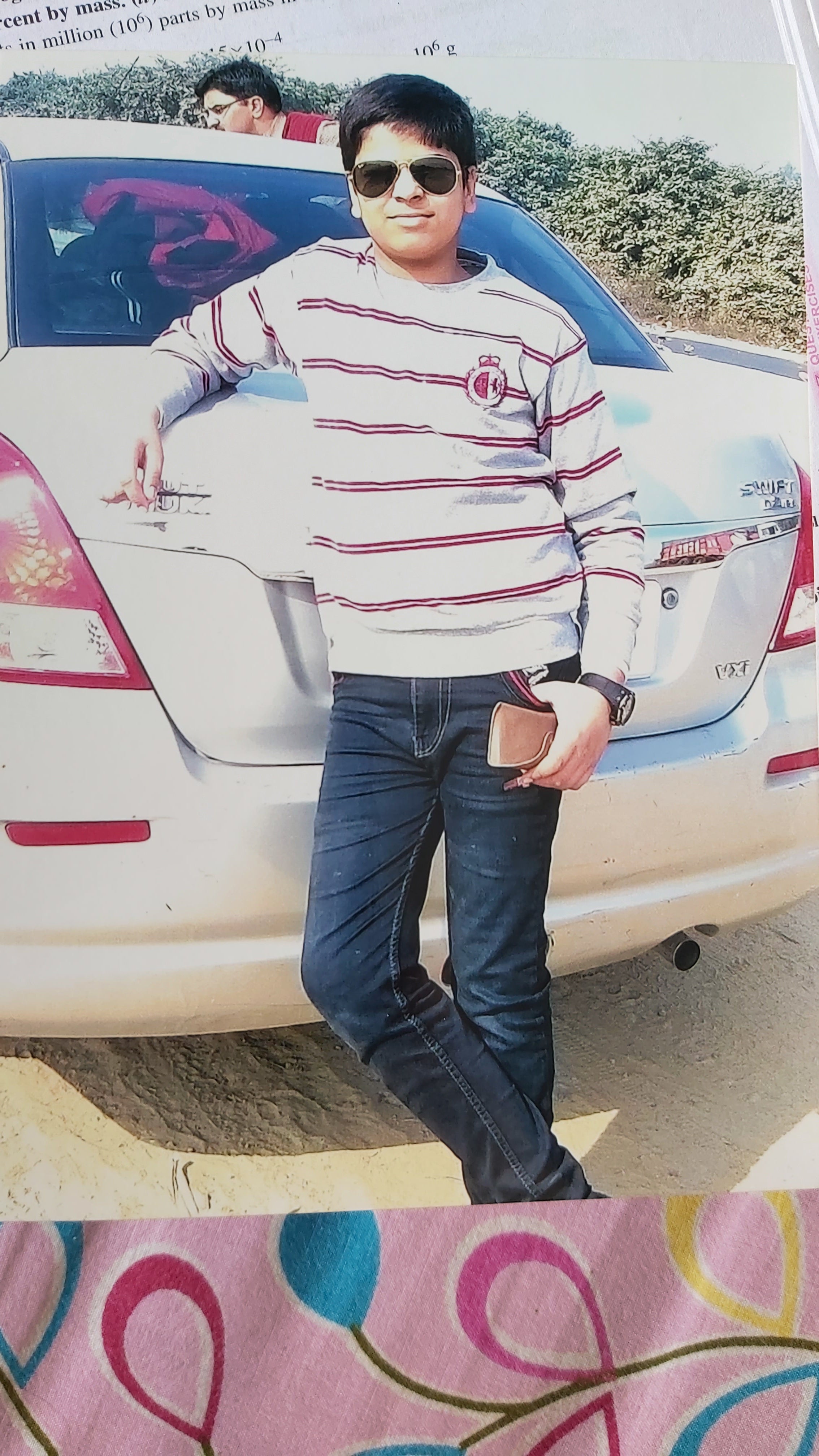 Rear view of a Maruti Suzuki Dzire VXI