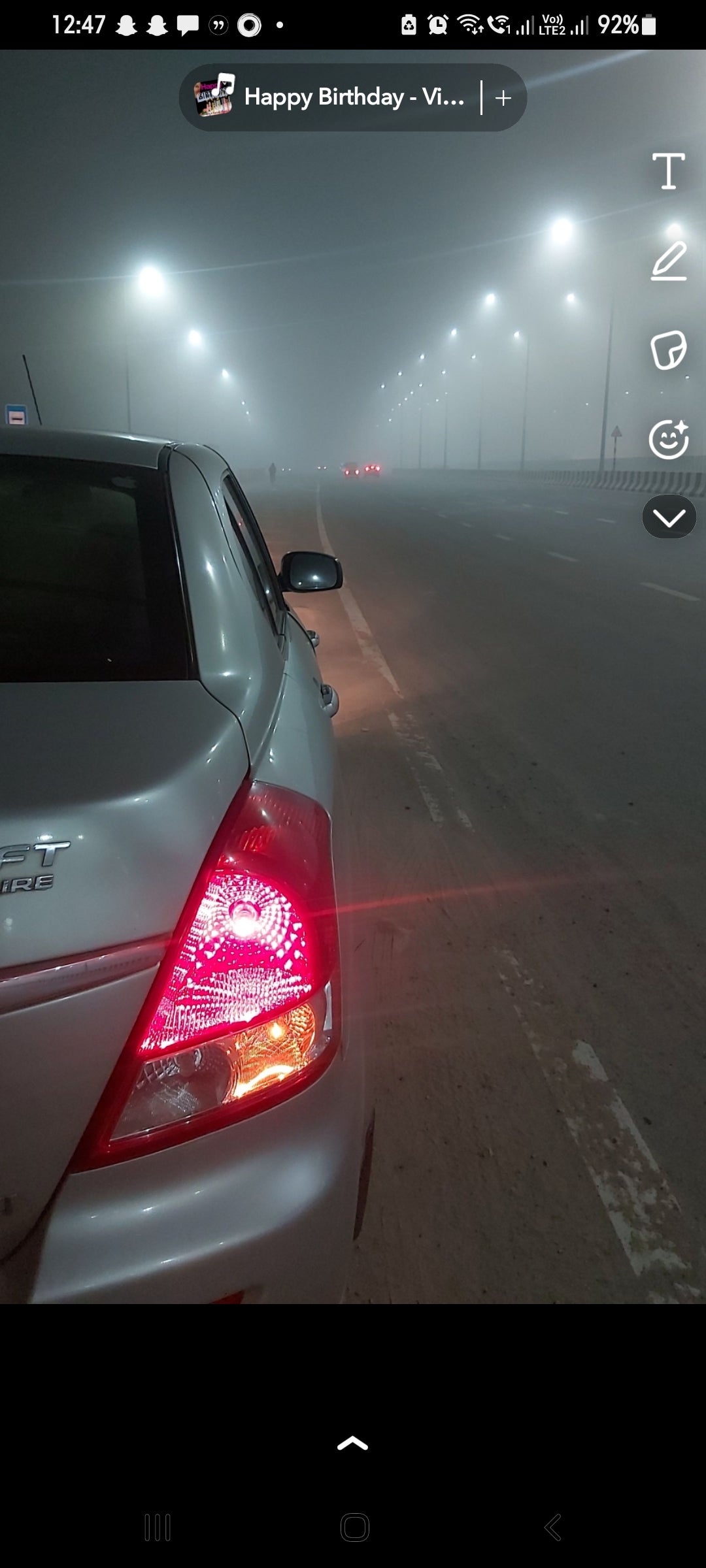 Rear left tail light view of a Maruti Suzuki Dzire