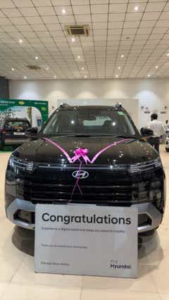 Front view of a Hyundai Alcazar at a showroom