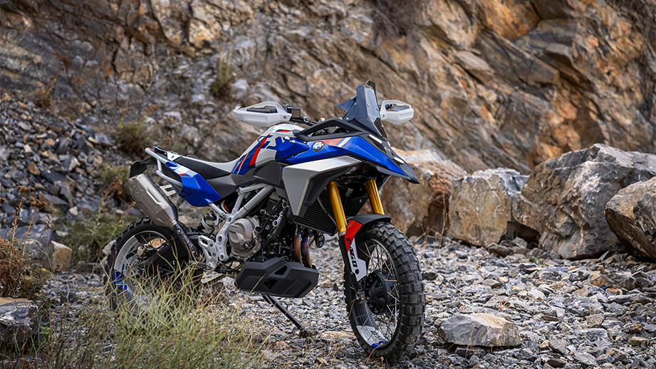 Full view of a BMW F 450 GS motorcycle on rocky terrain