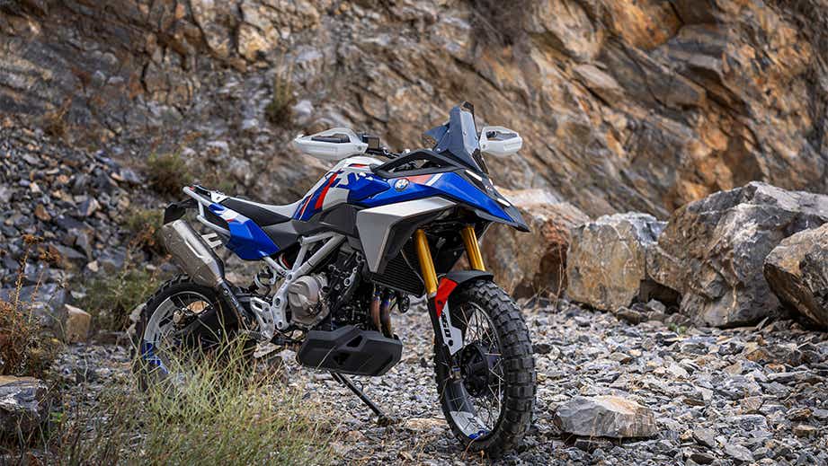 Full view of a BMW F 450 GS motorcycle on rocky terrain