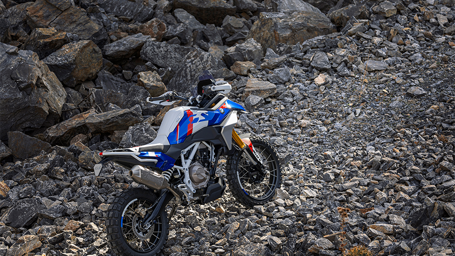 Side view of a BMW F 450 GS motorcycle on rocky terrain