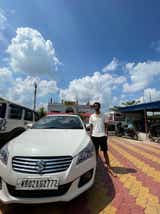 Front view of a Pearl Arctic White Maruti Suzuki Ciaz