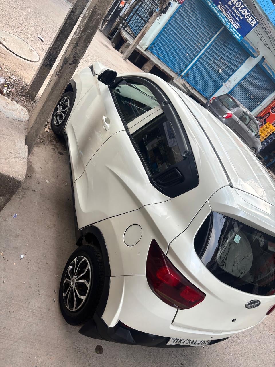 rear three-quarter view of a Mahindra KUV 100 NXT