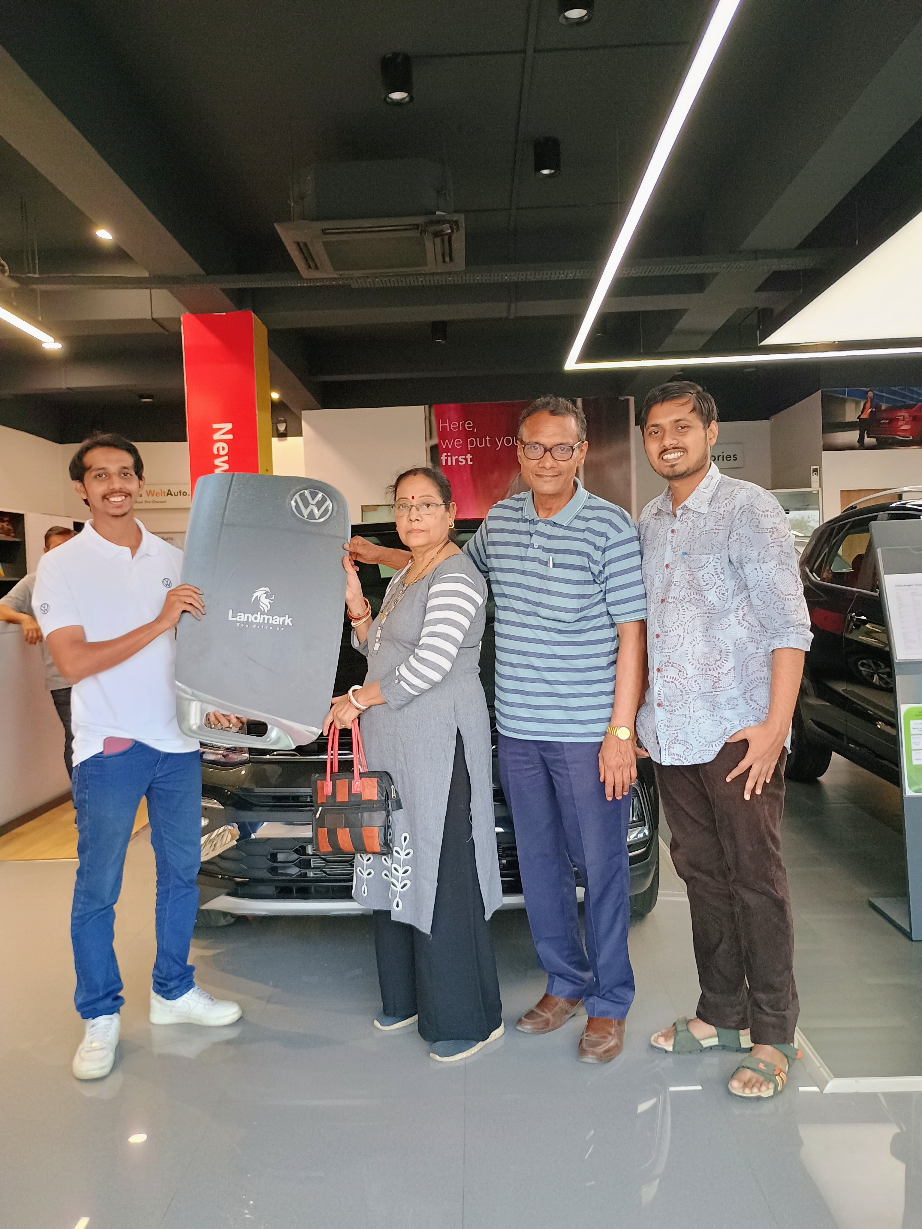 Front view of a Volkswagen Taigun at a dealership