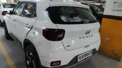 Rear three-quarter of a atlas white Hyundai Venue SX