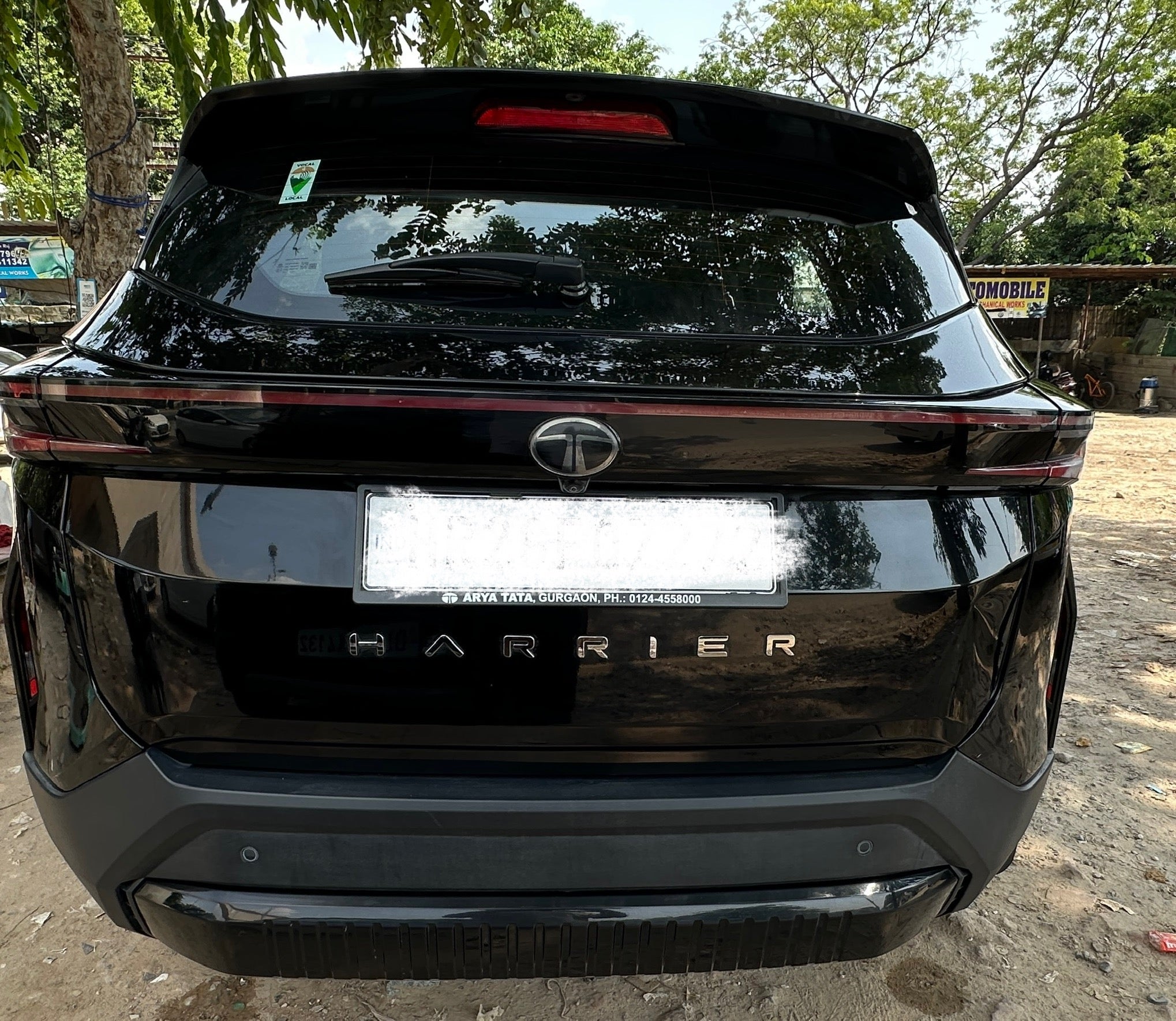 Rear view of a Oberon Black Tata Harrier