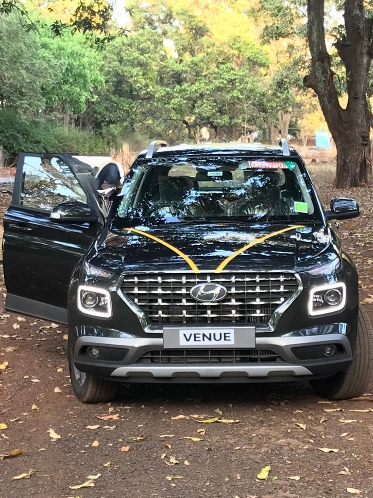 Front view of a Abyss Black Hyundai Venue