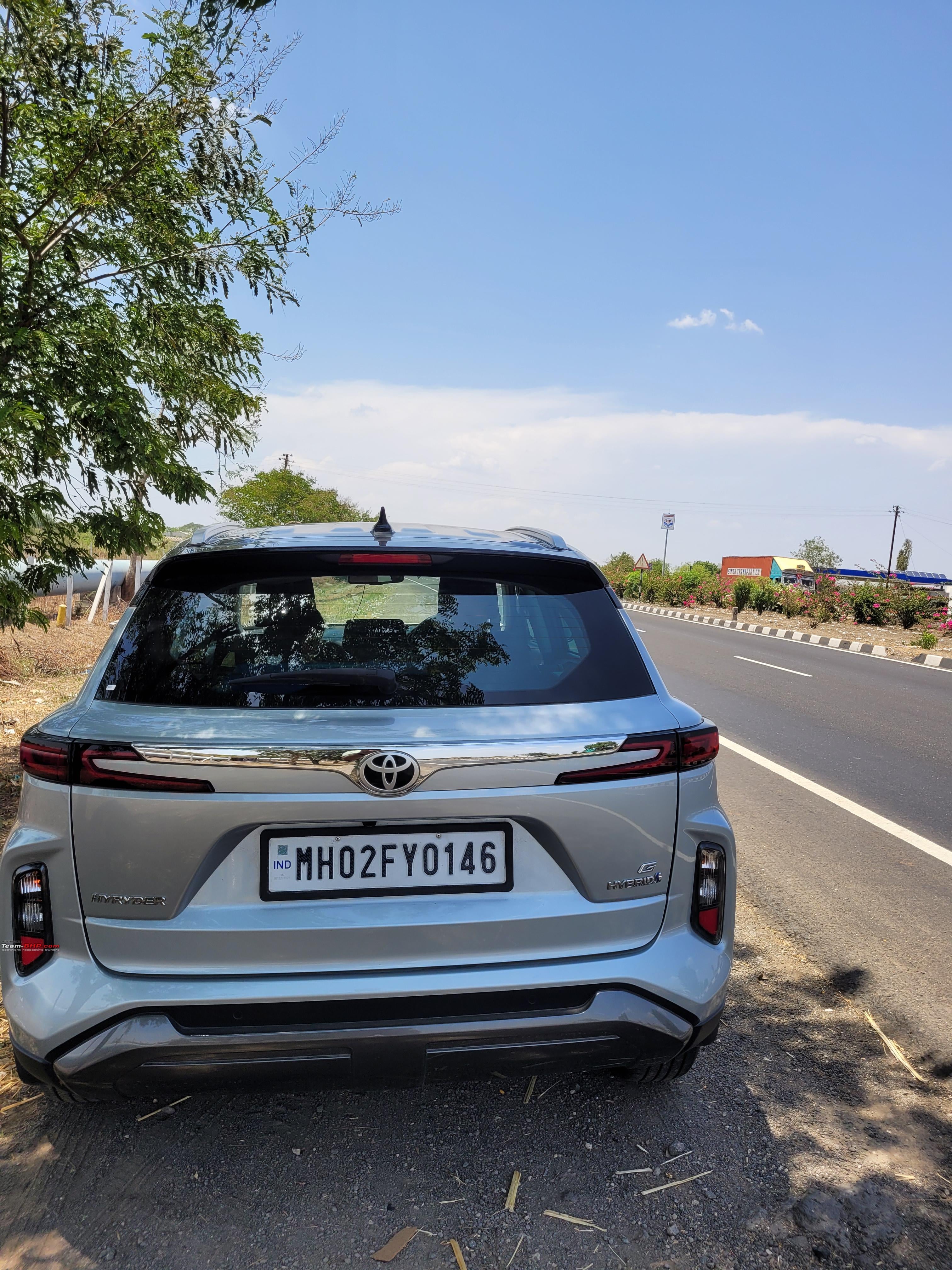 Rear view of a enticing-silver Toyota Urban Cruiser Hyryder