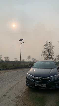 Front view of a Meteoroid Grey Metallic Honda City