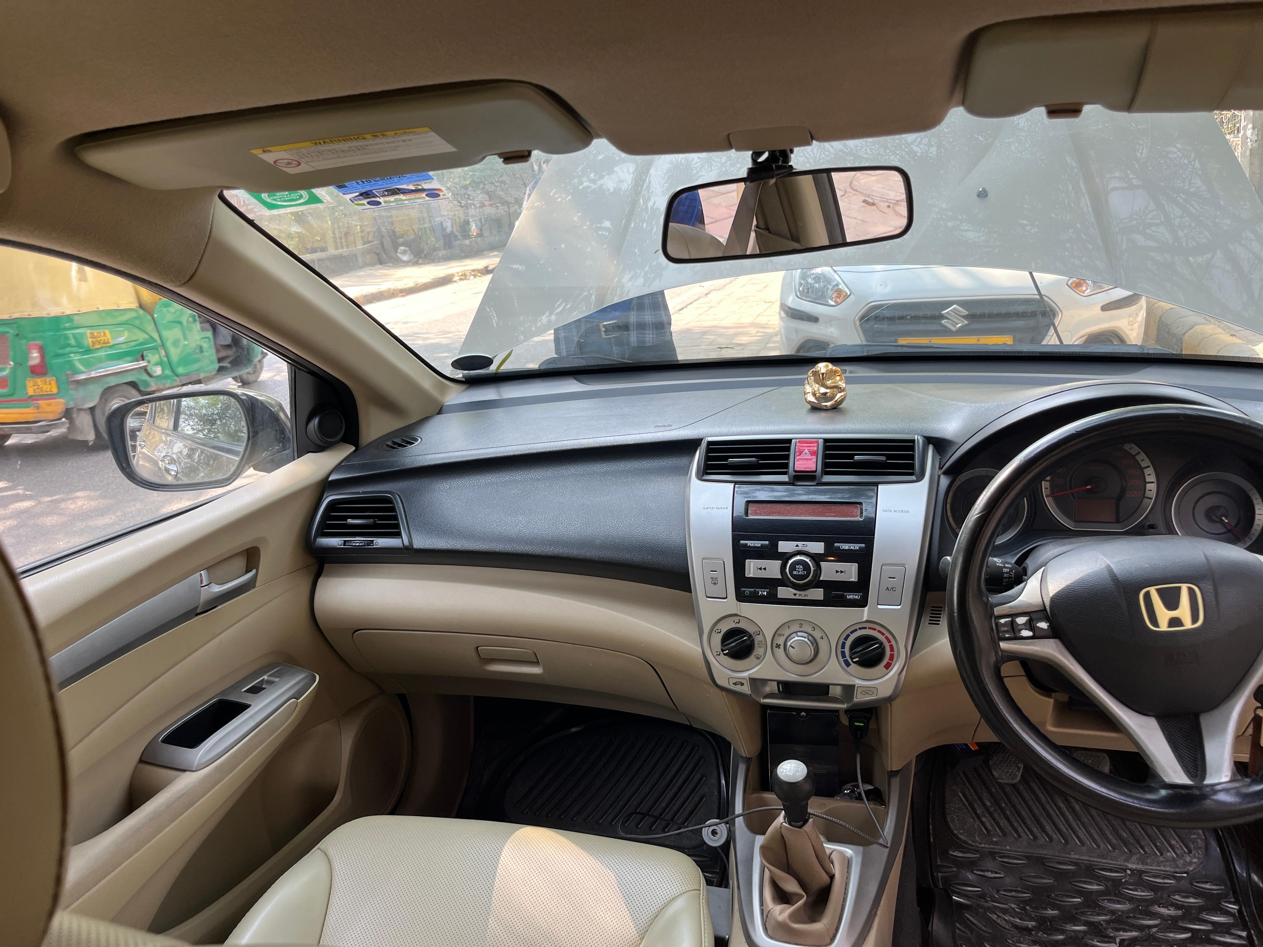 Interior dashboard view of a Honda City