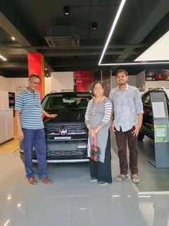 Front view of a Volkswagen Taigun at a dealership