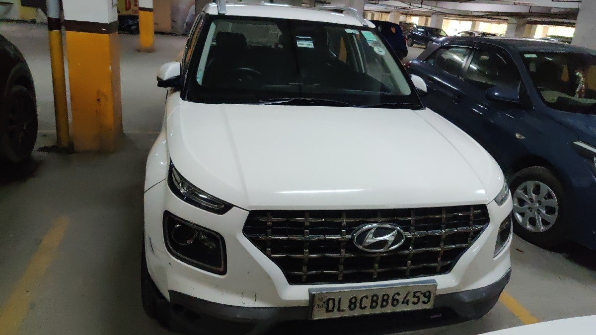 Front view of a Atlas White Hyundai Venue