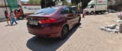 Rear three-quarter of a Honda City VX