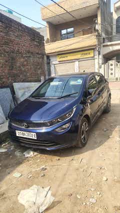 Front three-quarter view of a royal blue Tata Altroz