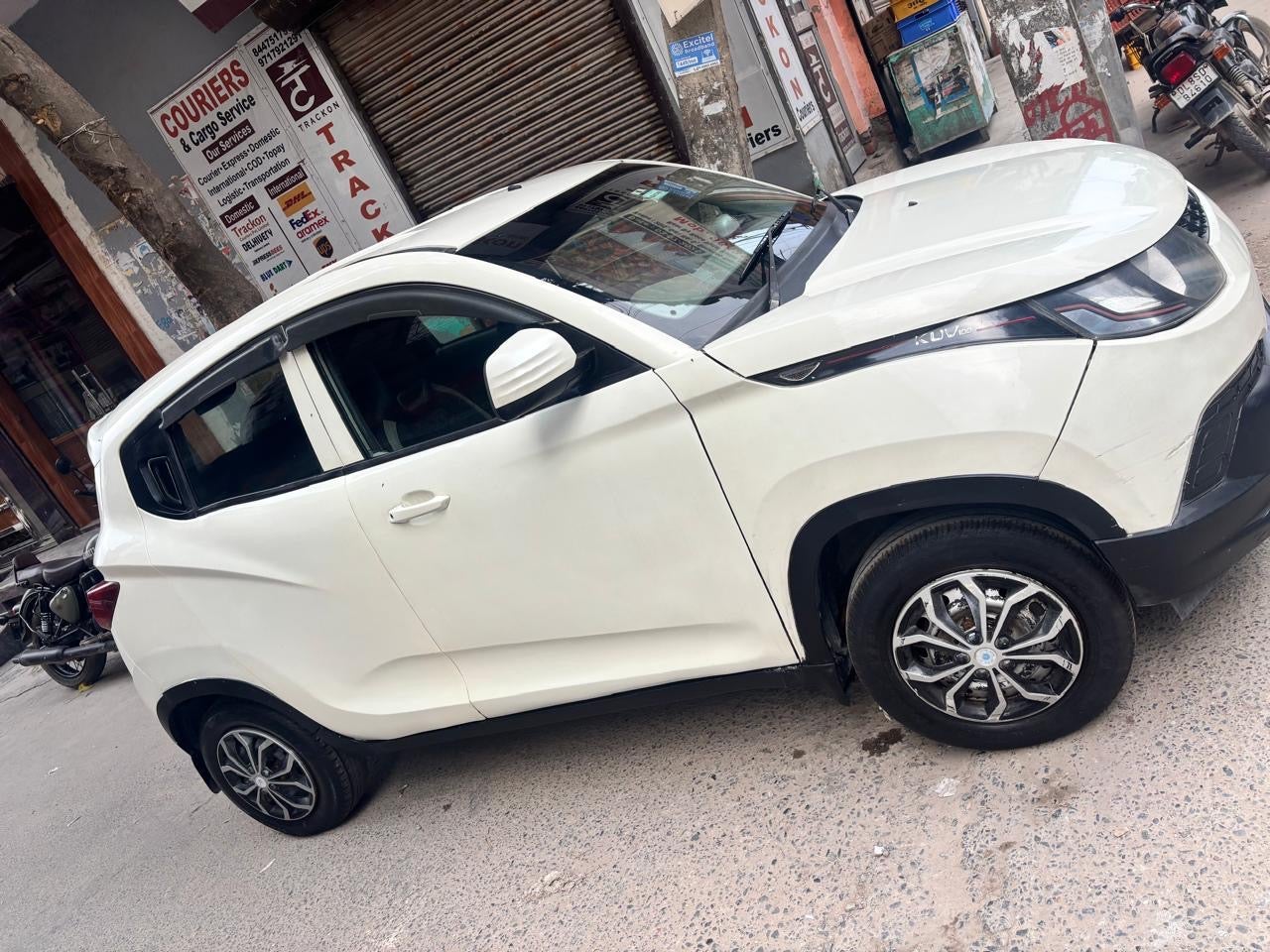 side view of a Mahindra KUV 100 NXT