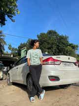 Rear three-quarter of a Pearl Arctic White Maruti Suzuki Ciaz