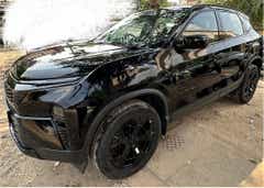 Front three-quarter view of a Oberon Black Tata Harrier