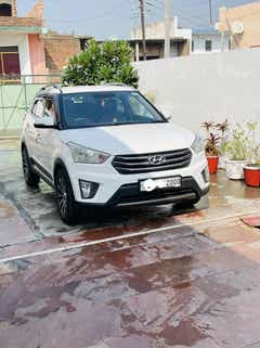 Front three-quarter of a Atlas White Hyundai Creta