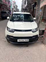 Front view of a Mahindra KUV 100 NXT