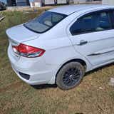 Rear three-quarter of a Maruti Suzuki Ciaz