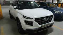 Front three-quarter of a Atlas White Hyundai Venue