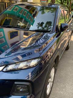 Front three-quarter view of a Nexa Blue Maruti Suzuki Grand Vitara