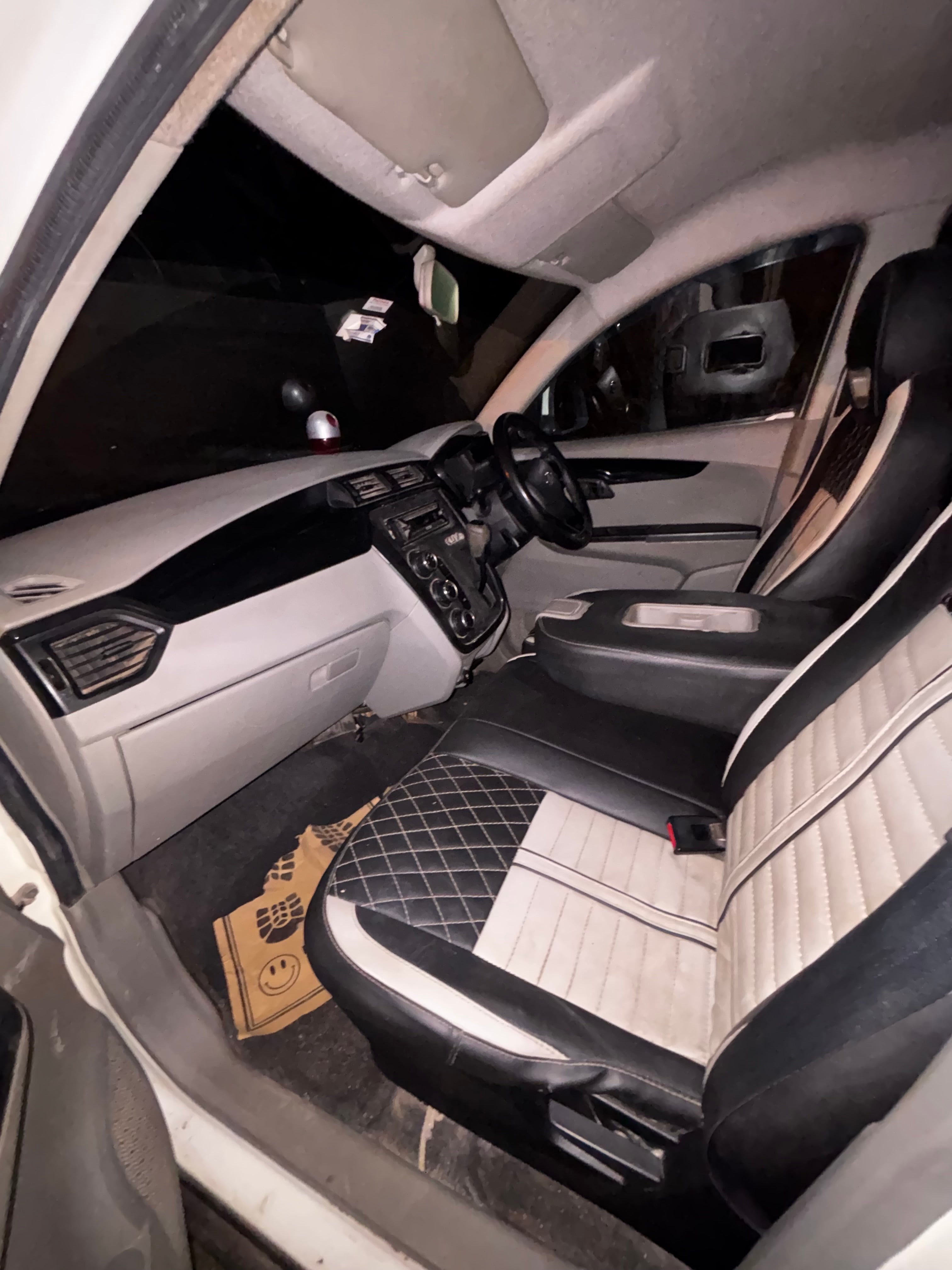 Interior dashboard view of a Mahindra KUV 100 NXT