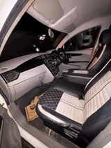 Interior dashboard view of a Mahindra KUV 100 NXT